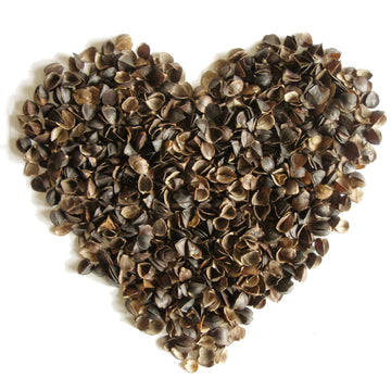 Buckwheat Hull Filling Product Image of buckwheat hulls in the shape of a heart.